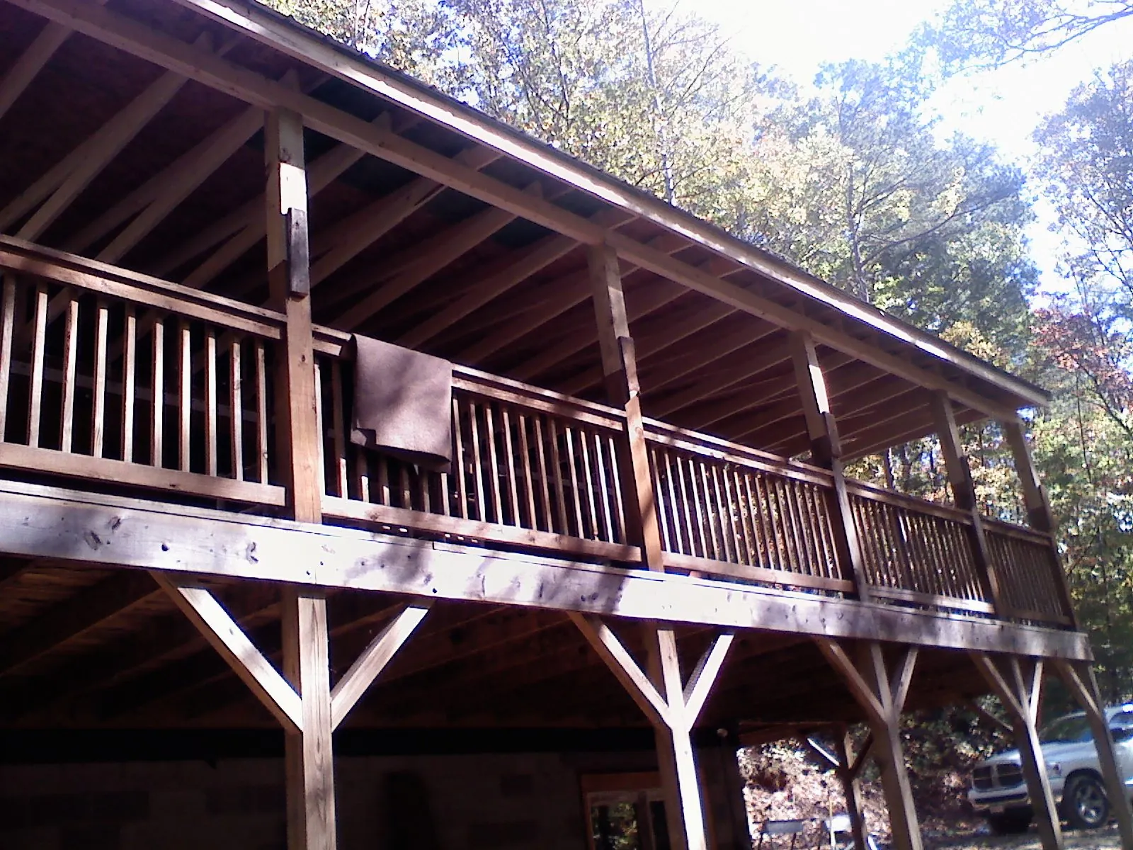 Timber framing under a new elevated porch and deck — Roof Leak Repair in Eldon by Roofing Brothers